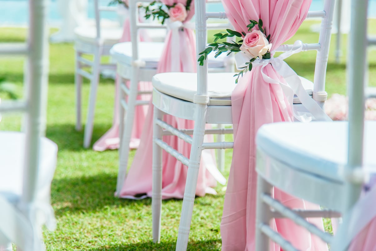 Wedding chair decorated with flowers.